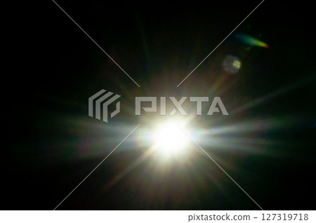 Sun flare on the black background 127319718