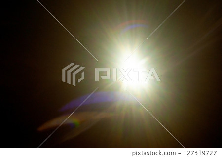 Sun flare on the black background 127319727