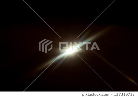 Sun flare on the black background 127319732