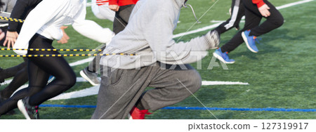 Resistance running at high school track and field practice Resistance running at high school track and field practice 127319917