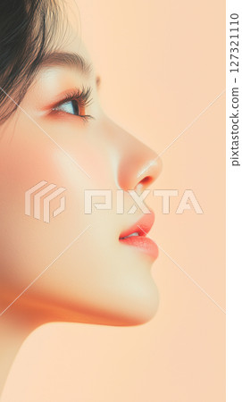 New Year, Christmas minimalist cosmetology banner with copy space, clean background, Asian woman, beauty industry New Year, Christmas minimalist cosmetology banner with copy space, clean background, Asian woman, beauty industry 127321110