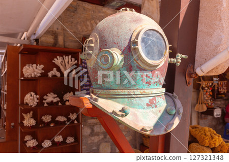 Vintage diving helmet in Symi, Greece 127321348