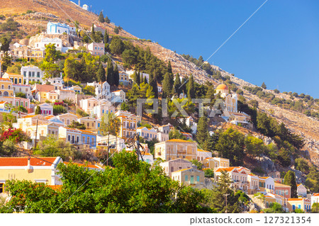 Colorful hillside houses in Symi, Greece Colorful hillside houses in Symi, Greece 127321354