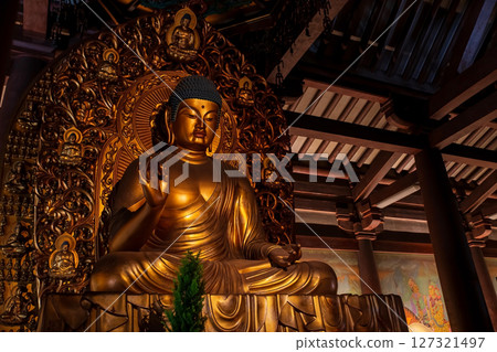 Golden Buddha with hand gesture statue in Shitennoji Kondo temple, Osaka Golden Buddha with hand gesture statue in Shitennoji Kondo temple, Osaka 127321497