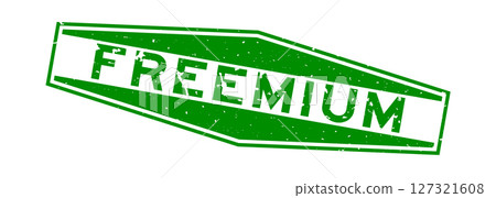 Grunge green freemium word hexagon rubber seal stamp on white background 127321608