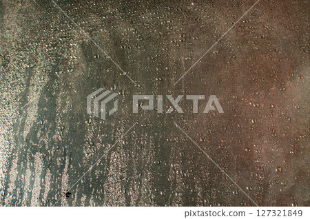 Water drops on glass window Water drops on glass window 127321849