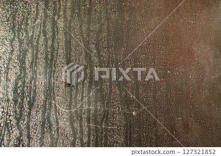 Water drops on glass window 127321852