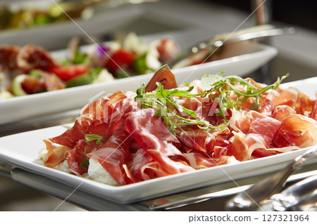 Side view of bacon served in a restaurant. Food and meat concept 127321964