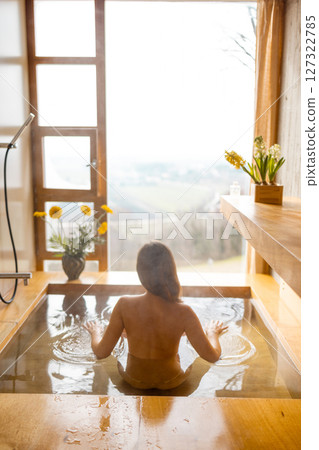 Relaxing in a Scenic Hot Bath 127322785