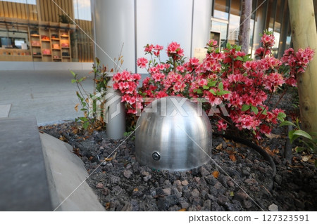 A dome-shaped watering faucet box installed at Takanawa Gate City in Tokyo A dome-shaped watering faucet box installed at Takanawa Gate City in Tokyo 127323591