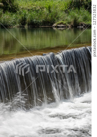 Stock photo of a small waterfall: Kanayama Bridge in Aira City, Kagoshima Prefecture Stock photo of a small waterfall: Kanayama Bridge in Aira City, Kagoshima Prefecture 127323832