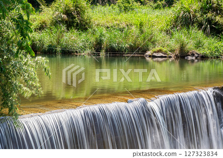 Stock photo of a small waterfall: Kanayama Bridge in Aira City, Kagoshima Prefecture Stock photo of a small waterfall: Kanayama Bridge in Aira City, Kagoshima Prefecture 127323834