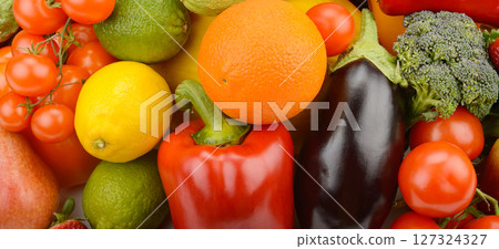 Assorted fresh ripe fruits and vegetables. Food concept background. Assorted fresh ripe fruits and vegetables. Food concept background. 127324327