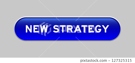Blue color capsule shape button with word new strategy on gray background 127325315