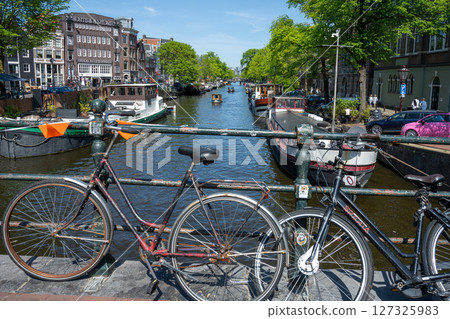Scenery along the canal in Amsterdam/Netherlands Scenery along the canal in Amsterdam/Netherlands 127325983