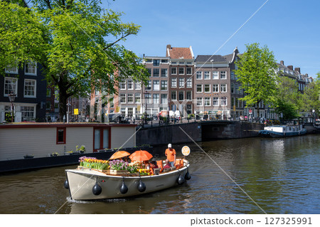 Scenery along the canal in Amsterdam/Netherlands Scenery along the canal in Amsterdam/Netherlands 127325991