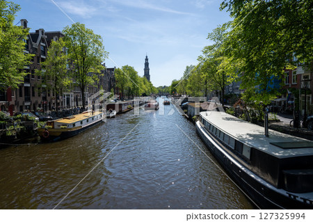 Scenery along the canal in Amsterdam/Netherlands Scenery along the canal in Amsterdam/Netherlands 127325994