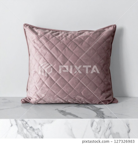 Dusty Rose Quilted Velvet Pillow on Marble Surface 127326983