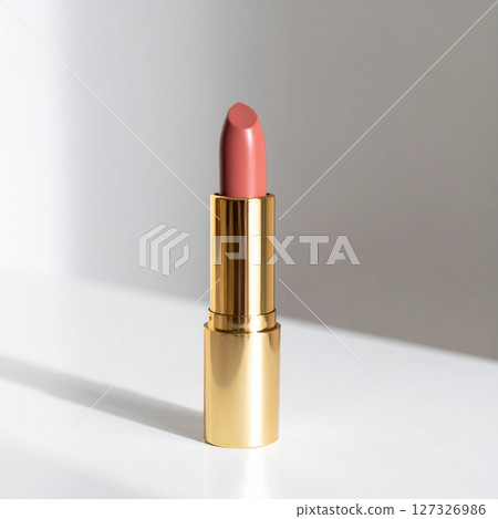 Nude Pink Lipstick in Gold Tube on White Background Nude Pink Lipstick in Gold Tube on White Background 127326986