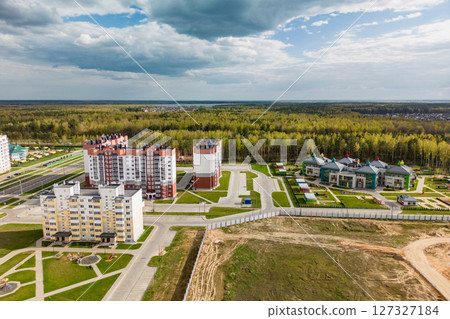 Cityscape of a residential area with modern apartment buildings, new green urban landscape in the city. Modern architectural building of the city. Mortgage. 127327184