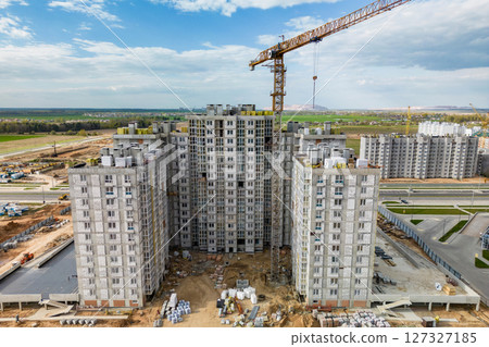 Monolithic reinforced concrete foundations for the construction of a large building. Rostverk at the construction site. Construction pit with foundation. Close-up. 127327185