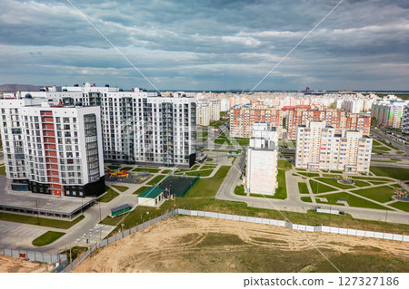 Cityscape of a residential area with modern apartment buildings, new green urban landscape in the city. Modern architectural building of the city. Mortgage. 127327186