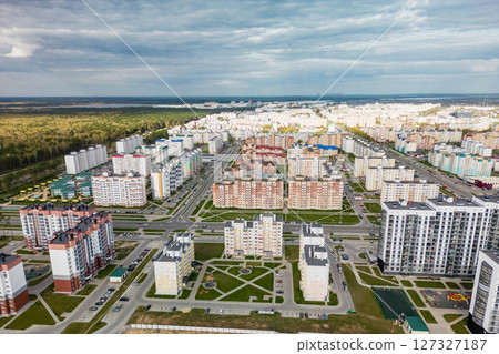 Cityscape of a residential area with modern apartment buildings, new green urban landscape in the city. Modern architectural building of the city. Mortgage. Cityscape of a residential area with modern apartment buildings, new green urban landscape in the city. Modern architectural building of the city. Mortgage. 127327187