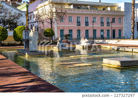 Silves, Portugal - Feb 21, 2025: Praca Al Mutamid Square with fountains and modern sculptures at Silves, Portugal 127327297