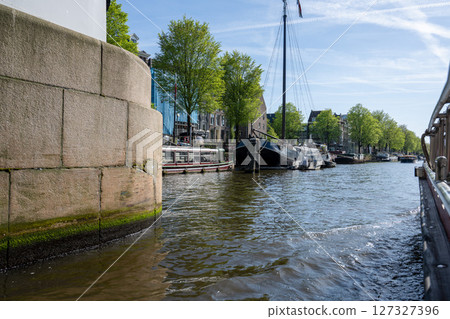 Amsterdam cityscape from a cruise ship/Netherlands Amsterdam cityscape from a cruise ship/Netherlands 127327396