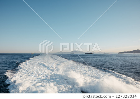 Wake Trail in the Strait of Gibraltar on a Clear Day Wake Trail in the Strait of Gibraltar on a Clear Day 127328034