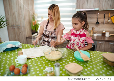 Baking together brings joy and creativity in a cozy kitchen 127328055