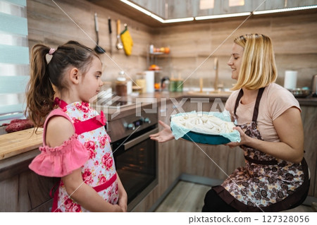 Cooking together brings joy in a cozy kitchen on a sunny afternoon 127328056