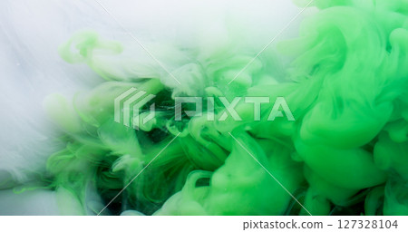 Magic fume. Paint blend. Green white swirl mystery stream. Color pigment dissolving art defocused abstract black background floating wave. Magic fume. Paint blend. Green white swirl mystery stream. Color pigment dissolving art defocused abstract black background floating wave. 127328104