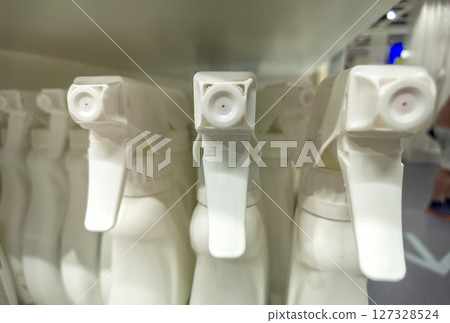 Close up of spray bottles in a shop Close up of spray bottles in a shop 127328524