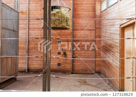Animal pen with hay feeder. Animal protection 127328629