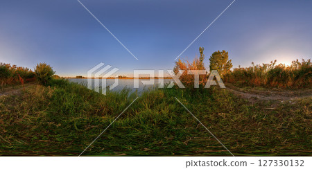 Spherical HDRi panorama of small pond shore at beautiful autumnal sunset at countryside 127330132