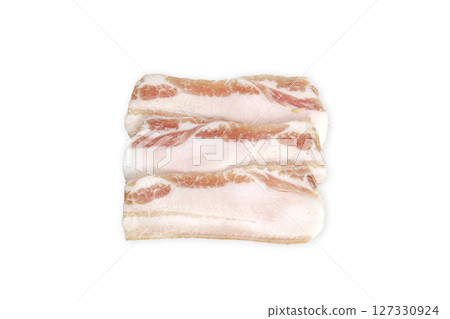 Slice of bacon or fatback isolated on white background 127330924