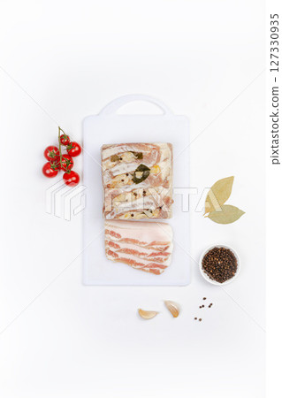 Traditional salted pork fat with spices and tomatoes Traditional salted pork fat with spices and tomatoes 127330935
