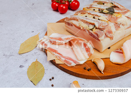 Raw pork fat with garlic. Salo. lard. 127330937