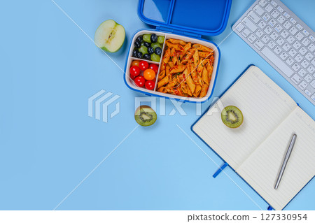 Lunch boxes with food ready for work or school. 127330954