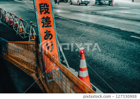 Road bumps and safety signs at night Road bumps and safety signs at night 127330988