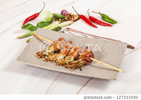 Thai Street foof satay with bacon and mushroom Thai Street foof satay with bacon and mushroom 127331030