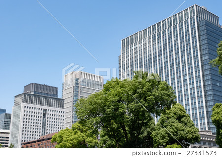 An office building with beautiful fresh greenery 127331573