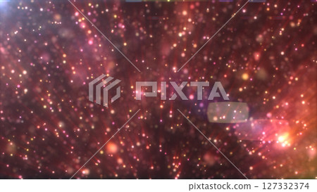 Abstract composition of sparkling red and orange light particles with dreamy bokeh effect, creating a warm cosmic atmosphere 127332374
