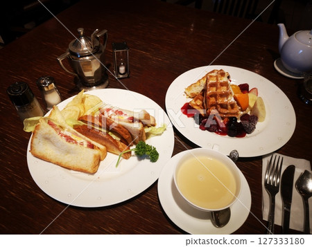 Coffee shop sandwiches and waffles 127333180