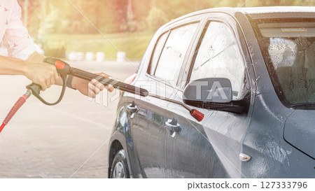 Car wash background. Car washing station foam. Man self service detail splash. Car wash background. Car washing station foam. Man self service detail splash. 127333796