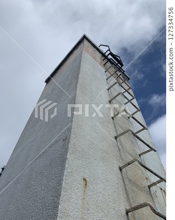 Old building and blue sky 127334756