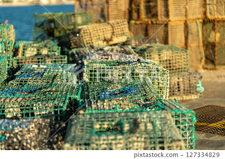 Crab Traps Stacked at a Coastal Dock Ready for the 127334829