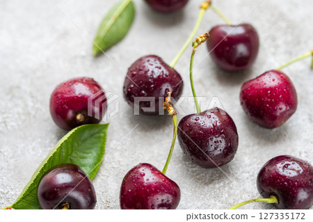 Fresh cherries fruits in a plate, macro photography, summer fruits. Abstract fruit food photo 127335172