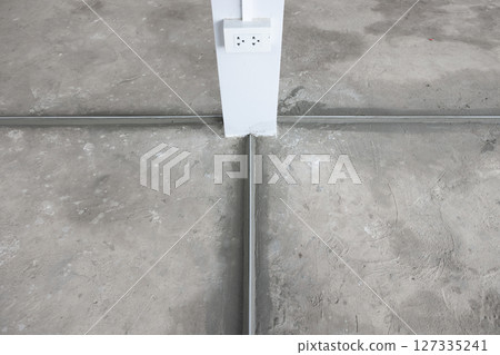 Dividing strips in terrazzo floor construction work. Dividing strips in terrazzo floor construction work. 127335241